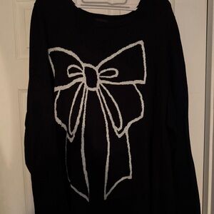 Torrid Black Sweater with White Bow Design